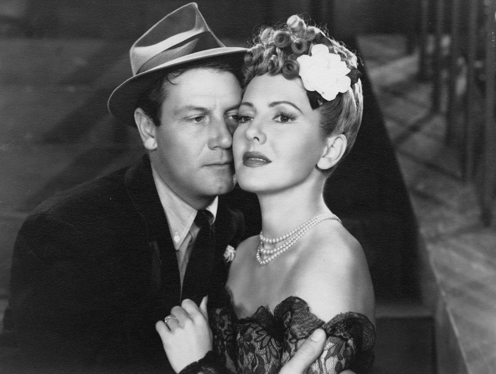 Joel McCrea and Jean Arthur in a scene from THE MORE THE MERRIER, 1943.